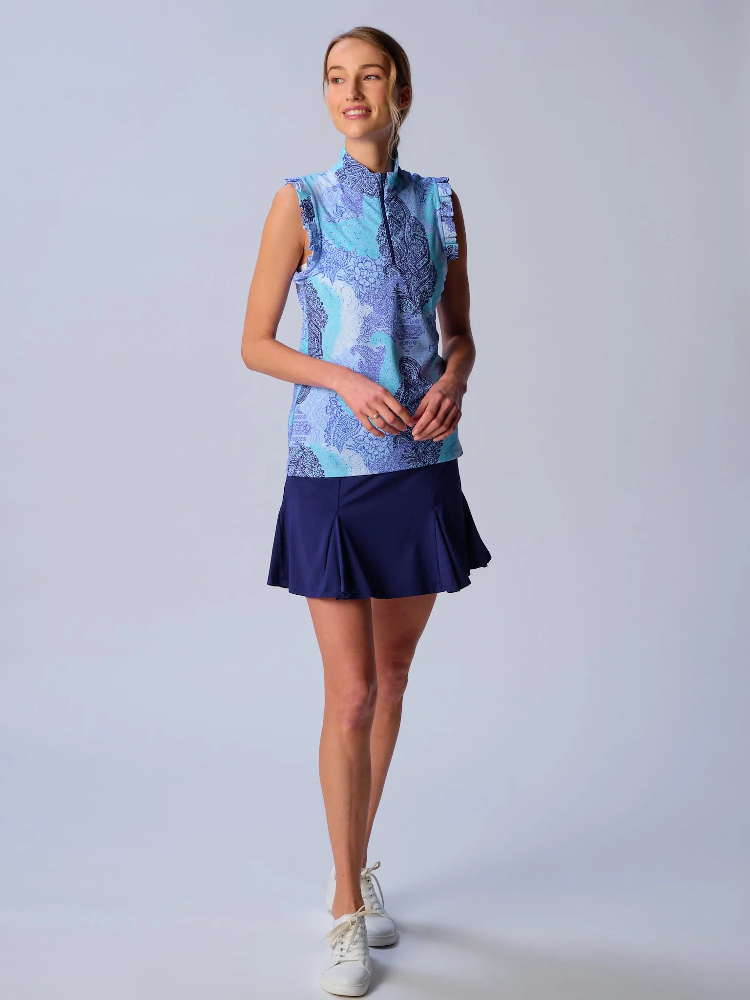 Sleeveless Quarter Zip Ruffle Top In Blue Paisley